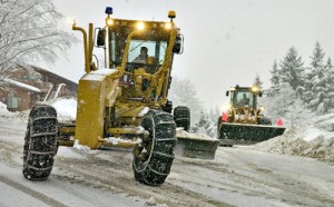 Snowy Juneau plows